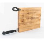wooden cutting board pictured with knife insert